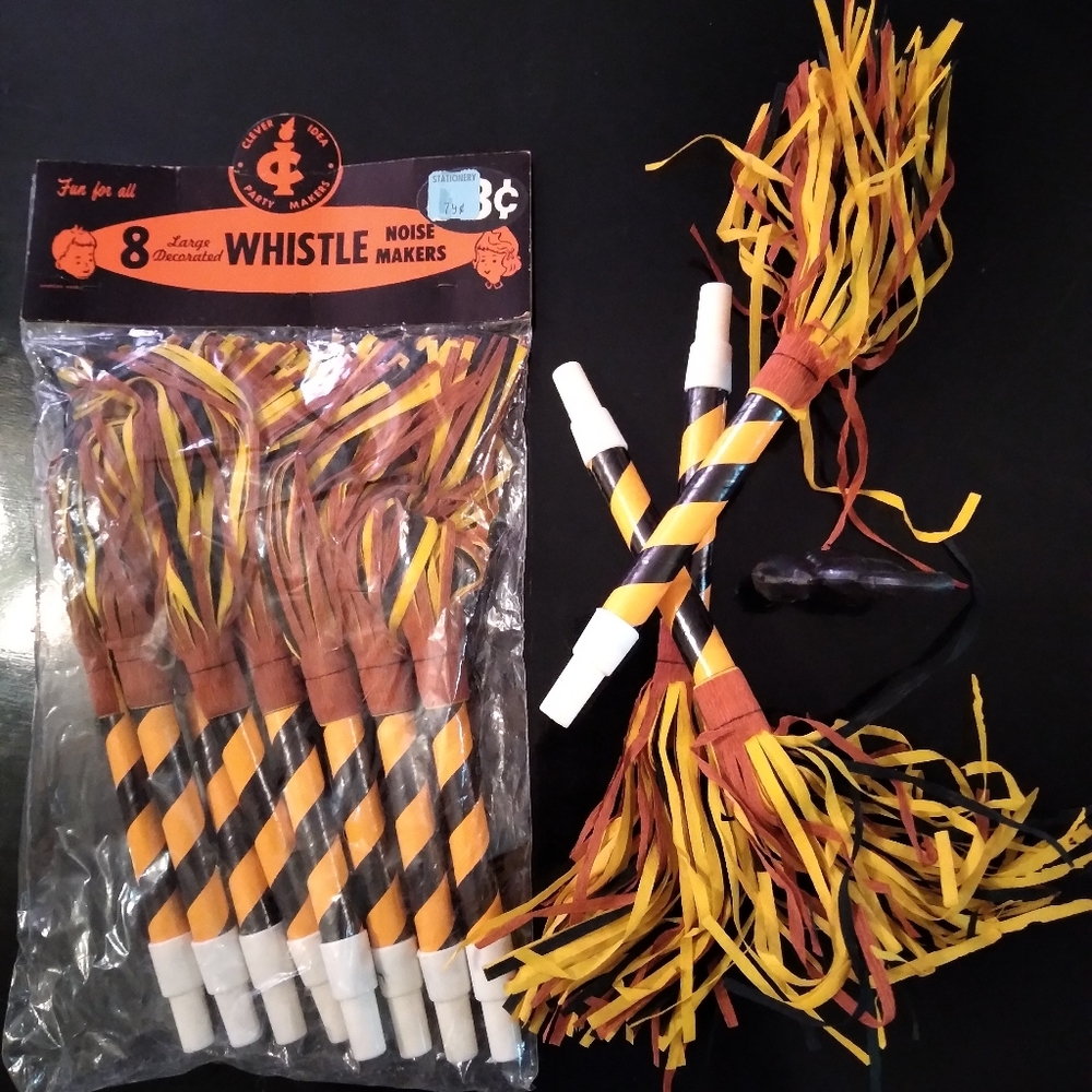 Vintage new in package 8 whistle noise makers and 3 single, with a black cat